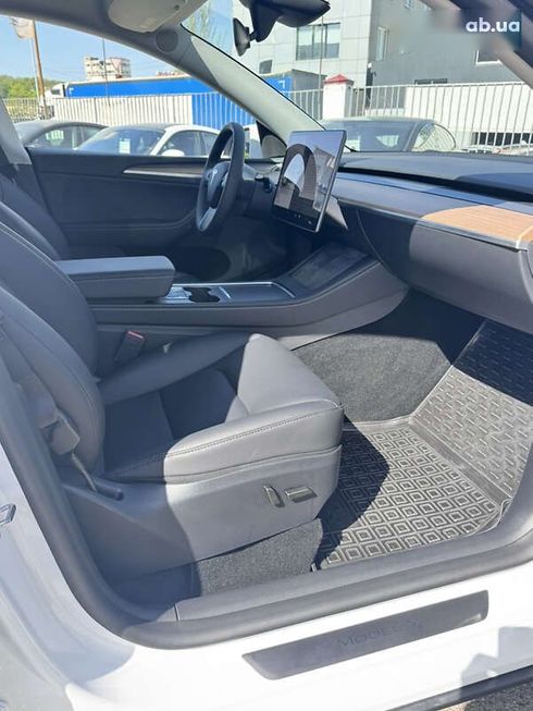 Tesla Model Y 2024 - фото 20