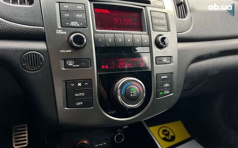 Kia Cerato 2011 - фото 11