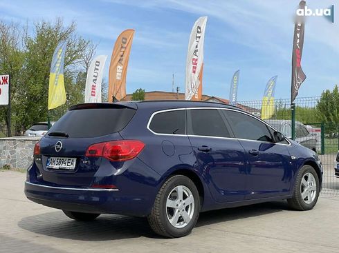 Opel Astra 2015 - фото 14