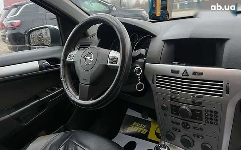 Opel Astra 2009 - фото 15