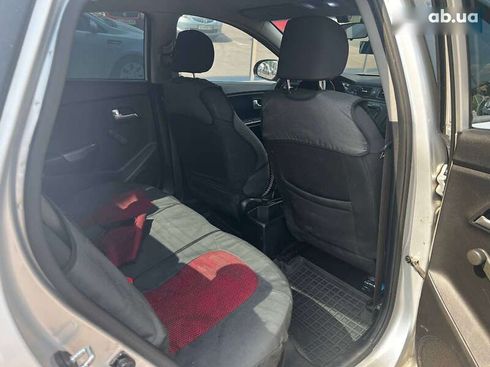 Kia Rio 2013 - фото 19