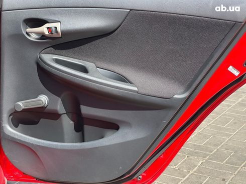 Toyota Corolla 2009 красный - фото 33