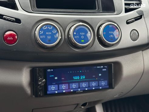 Mitsubishi l 200 2009 черный - фото 15