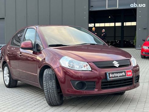 Suzuki SX4 2010 красный - фото 10