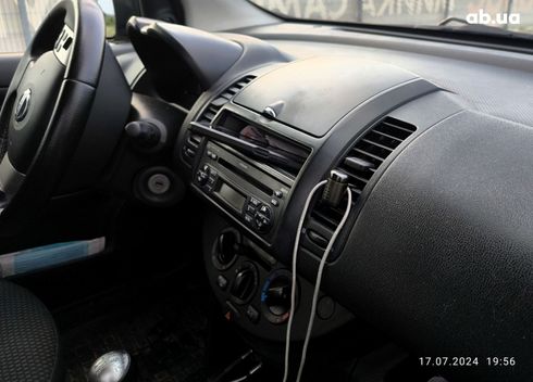 Nissan Note 2010 серебристый - фото 13