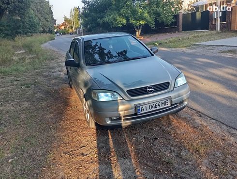 Opel Astra G 2008 серебристый - фото 10