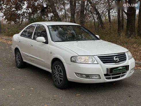 Nissan Almera 2011 - фото 11