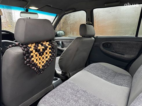 Daewoo Nexia 2006 серый - фото 20