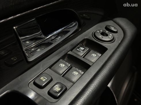 SsangYong Rexton 2010 черный - фото 10