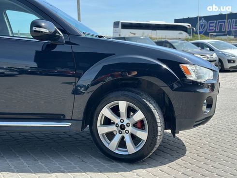 Mitsubishi Outlander XL 2010 черный - фото 11