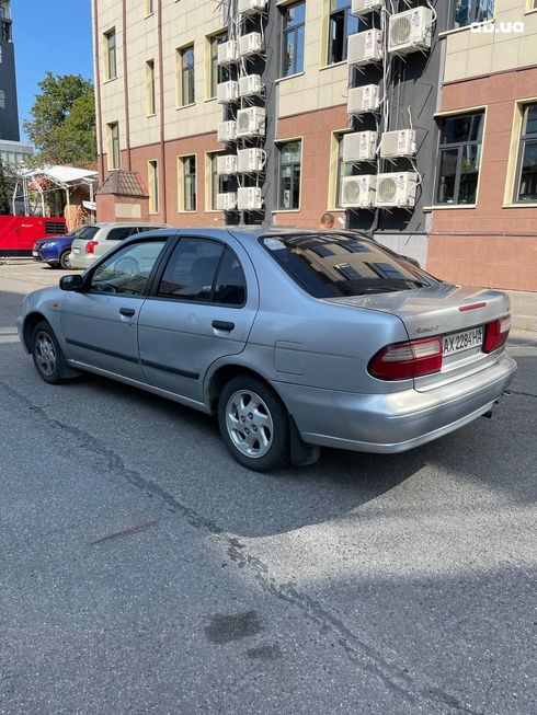 Nissan Almera 1998 серебристый - фото 13