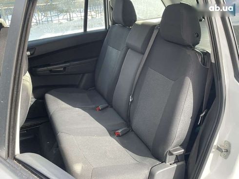 Opel Zafira 2012 - фото 11