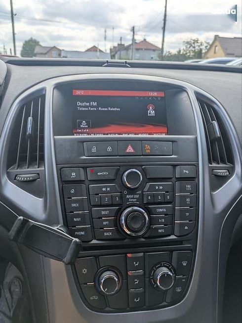 Opel Astra 2014 - фото 14