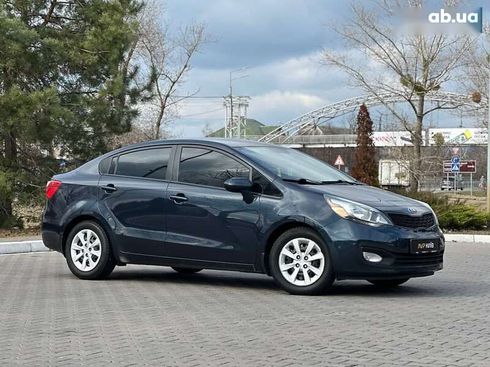 Kia Rio 2013 - фото 7