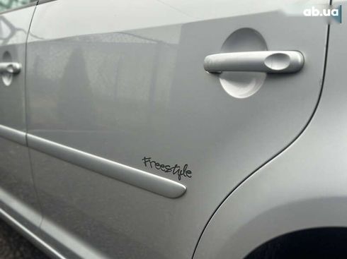 Volkswagen Touran 2010 - фото 14