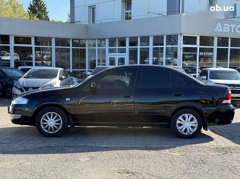 Nissan Almera 2012 - фото 5