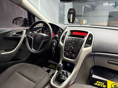 Opel Astra 2010 - фото 7