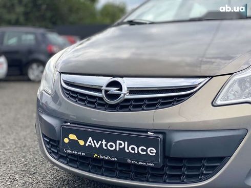 Opel Corsa 2011 - фото 11