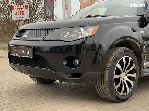 Mitsubishi Outlander XL 2009 - фото 11