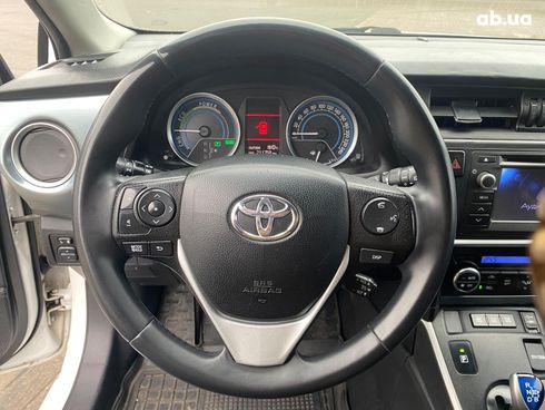 Toyota Auris 2014 белый - фото 14