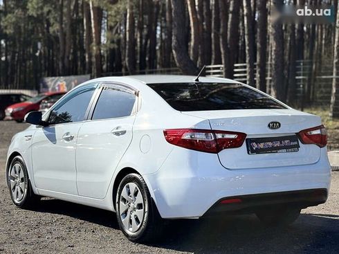 Kia Rio 2012 - фото 6