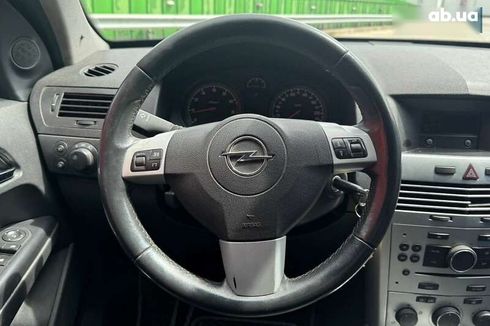 Opel Astra 2010 - фото 15