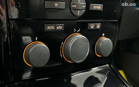 Opel Astra 2010 - фото 17