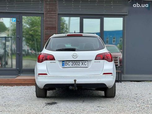 Opel Astra 2014 - фото 11