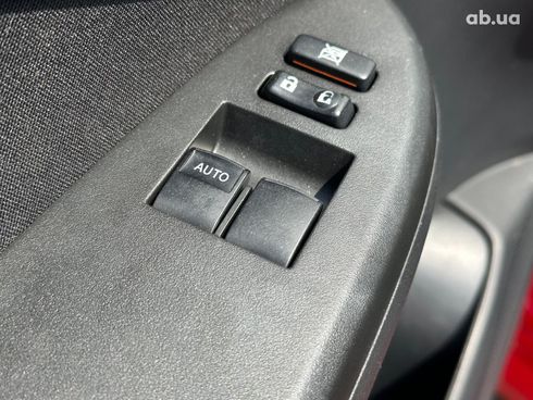 Toyota Corolla 2009 красный - фото 23