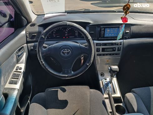 Toyota Corolla 2003 серый - фото 12