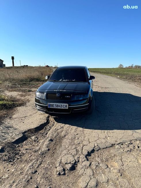 Skoda Superb 2005 черный - фото 6