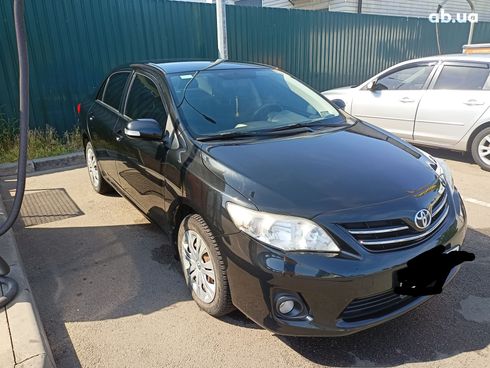 Toyota Corolla 2011 черный - фото 10