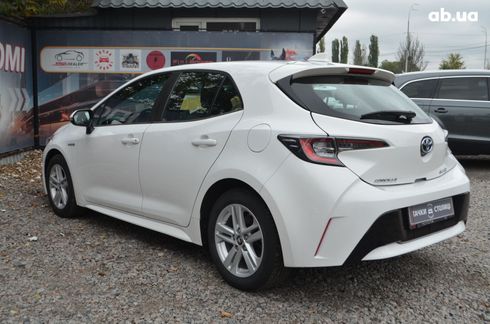 Toyota Corolla 2019 белый - фото 7