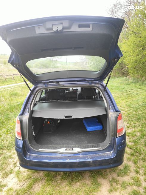 Opel Astra 2006 синий - фото 11