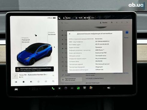 Tesla Model Y 2023 - фото 20