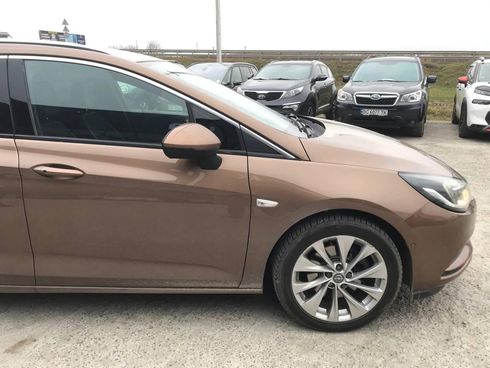 Opel Astra 2016 коричневый - фото 10