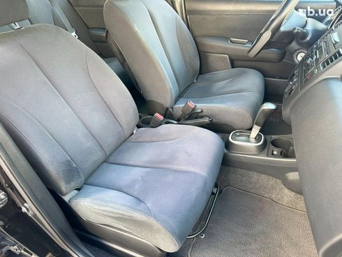 Nissan Versa 2009 черный - фото 17