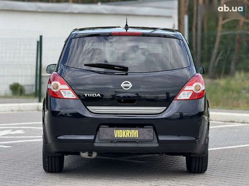 Nissan Tiida 2011 - фото 15