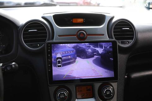 Kia Carens 2009 - фото 16