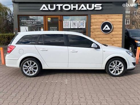 Opel Astra 2012 - фото 4