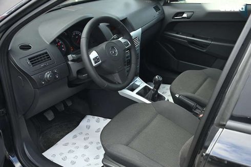 Opel Astra 2009 - фото 19