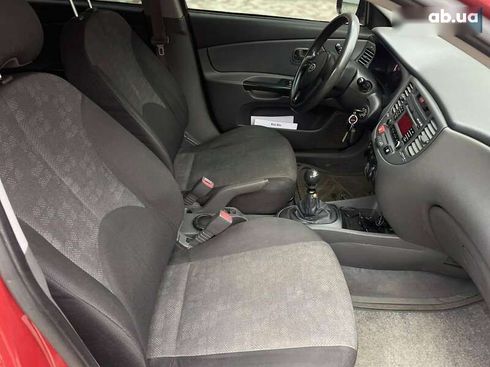 Kia Rio 2011 - фото 19