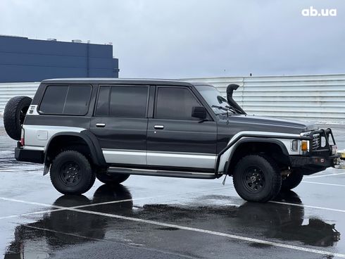 Nissan Patrol 1996 черный - фото 22