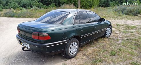 Opel Omega 1994 зеленый - фото 3