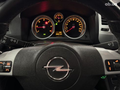 Opel Zafira 2010 серебристый - фото 5
