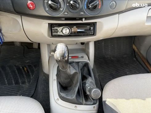 Mitsubishi L200 2010 зеленый - фото 6