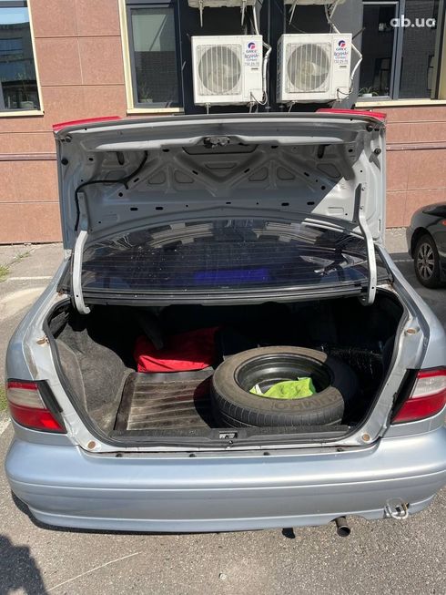 Nissan Almera 1998 серебристый - фото 5