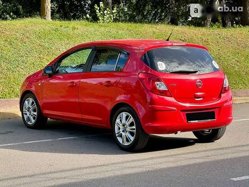 Opel Corsa 2011 - фото 11