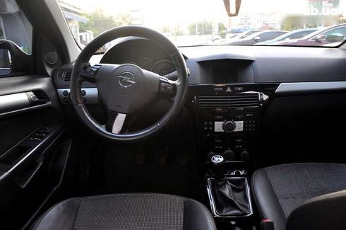 Opel Astra 2010 - фото 23