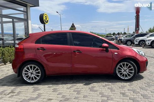 Kia Rio 2011 - фото 8